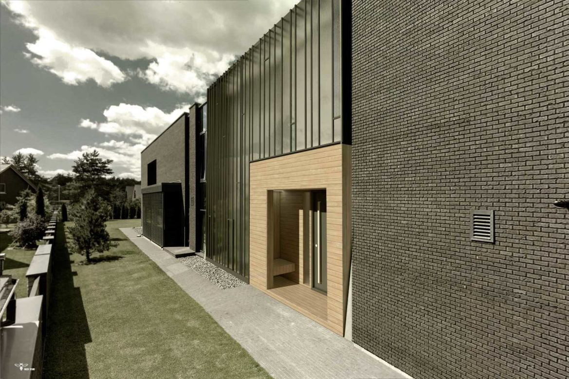 استودیو معماری دیدا طراحی معماری - نمای ساختمان مدرن که متشکل از متریال هایی چون چوب ترموود و شیشه های فیوز گلس با فریم های آهن مشکی